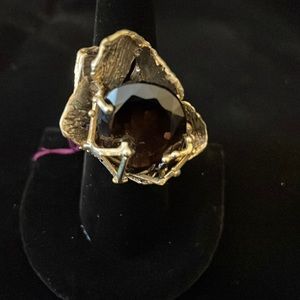 Silver and topaz ring